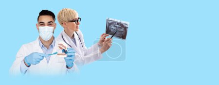 Foto de Collage of multiracial group of doctors dentists posing on blue studio background, woman looking at x-ray, man in medical face mask showing plastic human jaw, panorama with copy space - Imagen libre de derechos