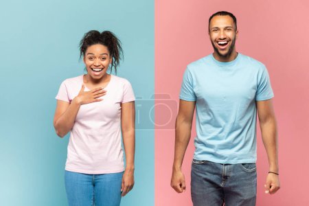 Foto de Emotional black woman and man laughting and looking at camera, lady touching chest, couple expressing positive emotions, standing over halved pink and blue studio background - Imagen libre de derechos