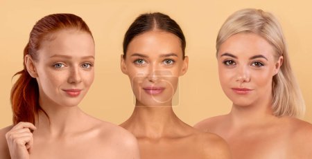 Téléchargez les photos : Youth and beauty. concept Attractive caucasian young ladies with light makeup posing naked on beige studio background, three beautiful topless women showing perfect smooth skin, banner - en image libre de droit