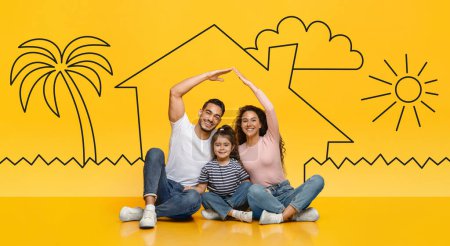 Téléchargez les photos : Family Insurance. Happy arab parents making symbolic roof of hands above little daughter, middle eastern mom and dad sitting together with child on floor over yellow with house doodles background - en image libre de droit