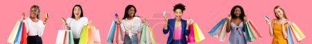Téléchargez les photos : Glad excited surprised black, caucasian young women hold many packages with purchases, credit card, enjoy shopping isolated on pink background, panorama. Emotions from sale, finance, ad and offer - en image libre de droit