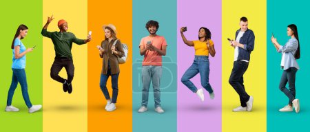 Foto de Smiling excited young international men and women taking selfie on smartphone, chatting and have fun isolated on colorful background, studio, panorama, full length. App, great news, sale and blog - Imagen libre de derechos
