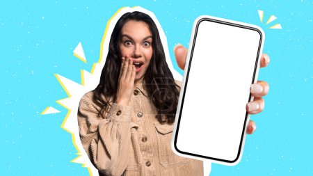 Photo for Surprised cheerful young european brunette female closes open mouth with hand, showing brand new cell phone with white empty screen, colorful background, collage for great offer and ad, mockup - Royalty Free Image