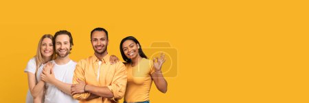 Photo for Relationship, love, marriage, family concept. Happy young caucasian and black couples posing on yellow studio background, cheerfully smiling and waving at camera, panorama with copy space, collage - Royalty Free Image