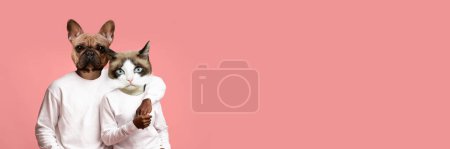 Photo for Beautiful african american lovers man with dog head and woman with cat head in similar outfits posing together on pink studio background, embracing, holding hands, panorama with copy space, collage - Royalty Free Image
