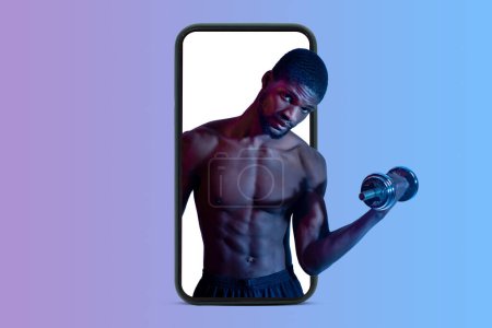 Photo for Serious confident muscular black guy with naked torso doing muscle exercises with dumbbell on phone isolated on neon studio background. Strength training, body care, sports blog - Royalty Free Image