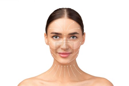 Antiaging Cosmetic Enhancement. Portrait Of Attractive Lady With Lifting Arrows On Face And Neck On White Studio Background, Symbolizing Rejuvenation And Facial Beauty. Age DefyingTreatment Concept