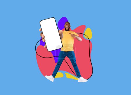 Photo for Online Offer. Black Cheerful Man Pointing At Big Blank Smartphone In Hand While Jumping Over Abstract Background With Colorful Splashes, African American Guy Recommending New App, Collage, Mockup - Royalty Free Image