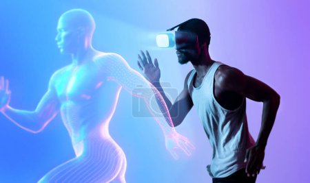 Photo for Fitness in metaverse. Side view portrait of sporty young black man in vr glasses playing virtual reality sport game with 3D avatar, running aside over neon background with glowing silhouette - Royalty Free Image