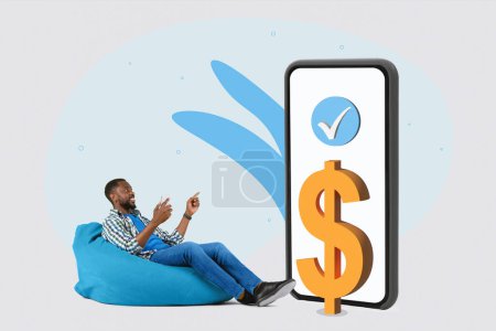 Photo for Online transaction concept. Cheerful black man pointing on huge smartphone with dollar icon on screen on light studio background, collage. Ecommerce - Royalty Free Image