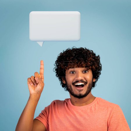 Photo for Great Idea Concept. Excited indian guy pointing index finger up showing blank text bubble icon above his head and smiling over blue studio background. Square shot, collage - Royalty Free Image