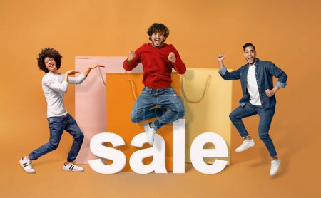 Photo for Joyful Buyers. Collage With Three Arabic Guys Jumping Near Giant Shopper Bags And Word Sale, Celebrating Great Sale Season Offers Over Orange Studio Background. Full Length Shot - Royalty Free Image