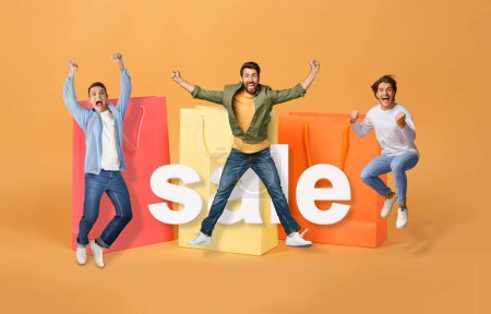 Photo for Great Shop Offer. Three Joyful Men Jumping And Shouting Near Big Shopping Bags And Word Sale, Celebrating Black Friday Posing Over Orange Studio Background. Sales Season Advert. Collage - Royalty Free Image