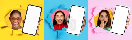 Photo for Colorful triptych of exuberant young multiracial women with stylish sunglasses peeking through ripped paper walls holding blank mobile phone screens for lively marketing designs - Royalty Free Image
