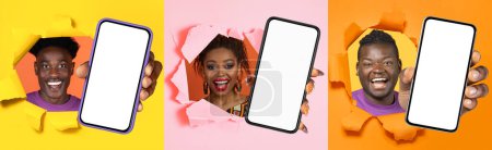 Photo for Smiling international of diverse individuals cheerfully peering through torn paper, each presenting a blank smartphone screen in a dynamic and engaging advertisement composition - Royalty Free Image
