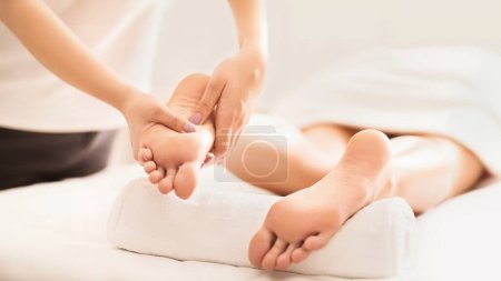 Photo for Acupressure And Reflexology Concept. Foot Massager Oppresses Energy Flow Points - Royalty Free Image