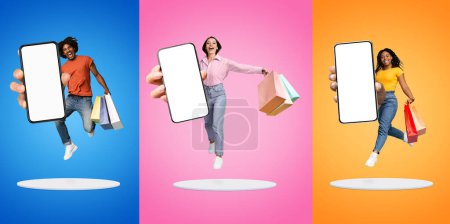 Photo for Online Store. Multiethnic People Holding Shopping Bags Jumping With Big Blank Smartphone In Hand Above Platform On Colorful Background, Cheerful Man And Women Recommending Sales App, Collage, Mockup - Royalty Free Image