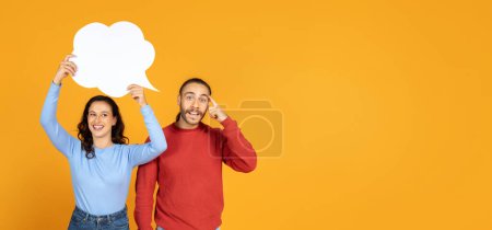 Photo for Inspired creative millennial man have great idea, touching his head, cheerful woman supportive wife girlfriend holding white blank speech bubble, panorama with copy space, orange background - Royalty Free Image