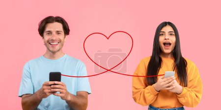 Photo for A smiling man in light blue shirt holds phone joyfully while surprised young woman in yellow sweater does same, connected by heart-shaped line on a pink background, conveying a digital relationship - Royalty Free Image