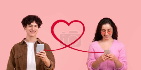 Photo for A young man and woman in casual wear are engaged with their smartphones, connected by a whimsical red heart illustration on a soft pink background, evoking online dating vibes - Royalty Free Image