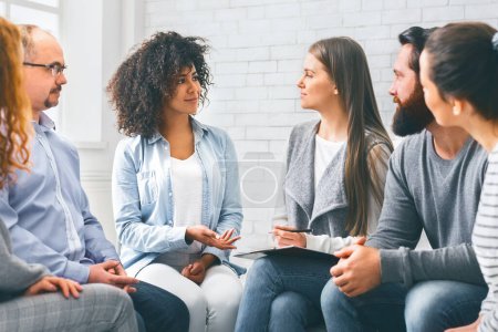 Photo for Support group meeting. Patients talking with professional therapist, panorama - Royalty Free Image