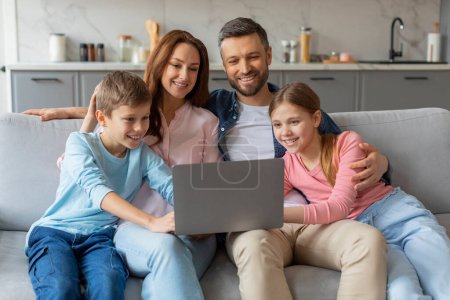 Photo for The blend of european family unity and modern technology is shown as they collectively use a laptop at home, expressing love and strengthening relationships - Royalty Free Image