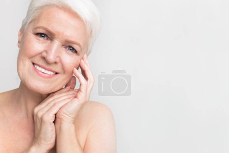 An elderly european woman beams with a healthy complexion, embodying the vitality and happiness associated with s3niorlife