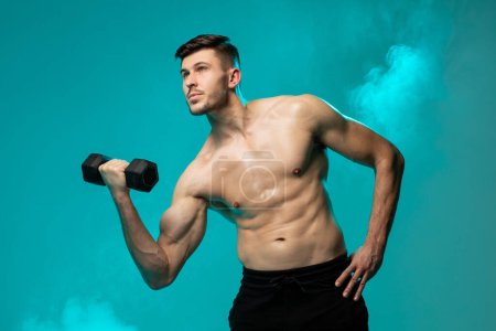 A man with a shirt is shown performing dumbbell exercises on a solid blue background. He is lifting the dumbbells with both hands, focusing on his bicep muscles