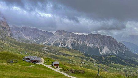 Photo for From Seceda peak, Italy's Dolomites reveal a breathtaking panorama. Trentino Alto Adige, Europe. Morning unveils majestic Furchetta peak in the Alps - Royalty Free Image