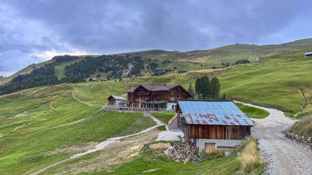Photo for Fermeda Hut in Seceda, A serene retreat in the Dolomite panorama, offering comfort amid South Tyrol's breathtaking mountain beauty - Royalty Free Image