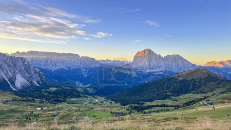 Photo for Atop Seceda peak in Italy's Dolomites, a breathtaking panorama unfolds. Trentino Alto Adige, Europe. Morning reveals majestic Furchetta peak in the Alps. - Royalty Free Image