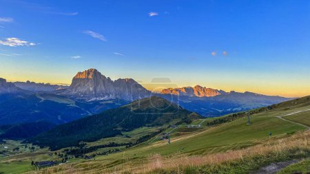 Photo for Seceda peak in Italy's Dolomites offers a breathtaking panorama. Trentino Alto Adige, Europe. Morning unveils the majestic Furchetta peak in the Alps. - Royalty Free Image