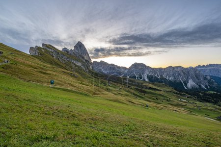 Photo for Morning's golden embrace over Seceda, Dolomites, Italy, a breathtaking sunrise paints the peaks and valleys in hues of warmth and tranquility. - Royalty Free Image