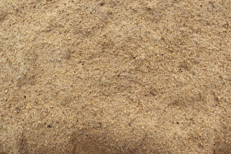 Foto de Vista de fondo de la superficie de arena de la pila de arena de construcción que no fue refinada - Imagen libre de derechos
