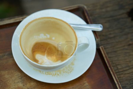Photo for Finished coffee mug was placed on the table. - Royalty Free Image