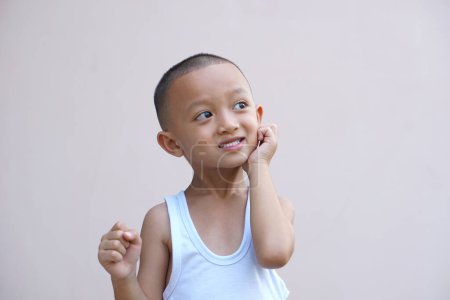 Photo for Asian boy having itchy face - Royalty Free Image