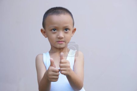 Photo for Asian boy great thumbs up - Royalty Free Image