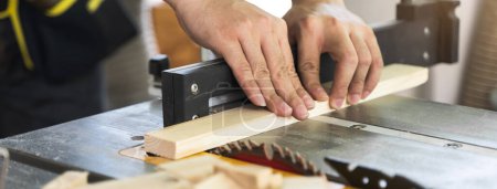 Photo for Hands of person doing diy project at home. Man measuring wood to doing cabinet craftworks as a hobby. - Royalty Free Image