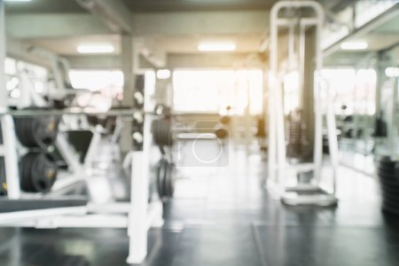 Photo for Blur fitness room gym with equipment for exercise and nobody people use as background - Royalty Free Image