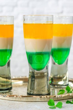 Photo for Irish flag shots - traditional St Patricks Day layered alcoholic drinks - Royalty Free Image