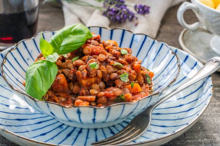 Photo for Vegetarian lentil bolognese with mushrooms and carrots - Royalty Free Image