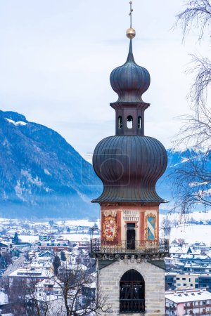 Bell tower of the St Katherine's Church built in 1345 in Bruneck-Brunico, Italy. Selective focus