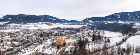 Wide panoramic aerial view of Brunico (Bruneck), South Tyrol, Italy in the winter.