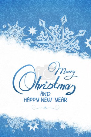 Foto de Tarjeta de Navidad con copos de nieve y texto de año nuevo. - Imagen libre de derechos