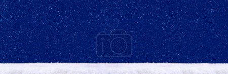 Photo for Christmas background with white snow isolated on blue. - Royalty Free Image