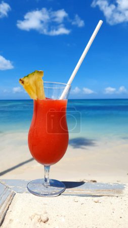 Photo for Beach cocktail with lemon on Caribbean beach. - Royalty Free Image
