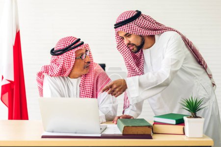 Photo for Successful of group collegue arab business people working with laptop computer and document report.Creative arabic business people meeting and planning strategy analysis with new startup idea project - Royalty Free Image