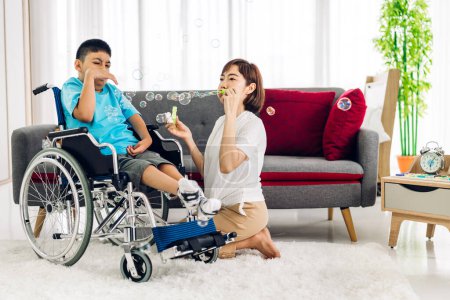 Photo for Portrait of asian physiotherapist carer helping and playing with disabled child health problem by doing exercises in rehabilitation clinic.disability care concept - Royalty Free Image