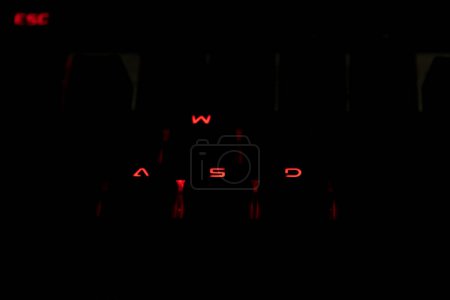 Photo for FPS keyboard buttons luminated in red. Gaming keyboard concept - Royalty Free Image