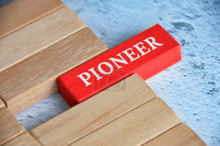 Photo for Top view of Pioneer text on red color wooden blocks. - Royalty Free Image